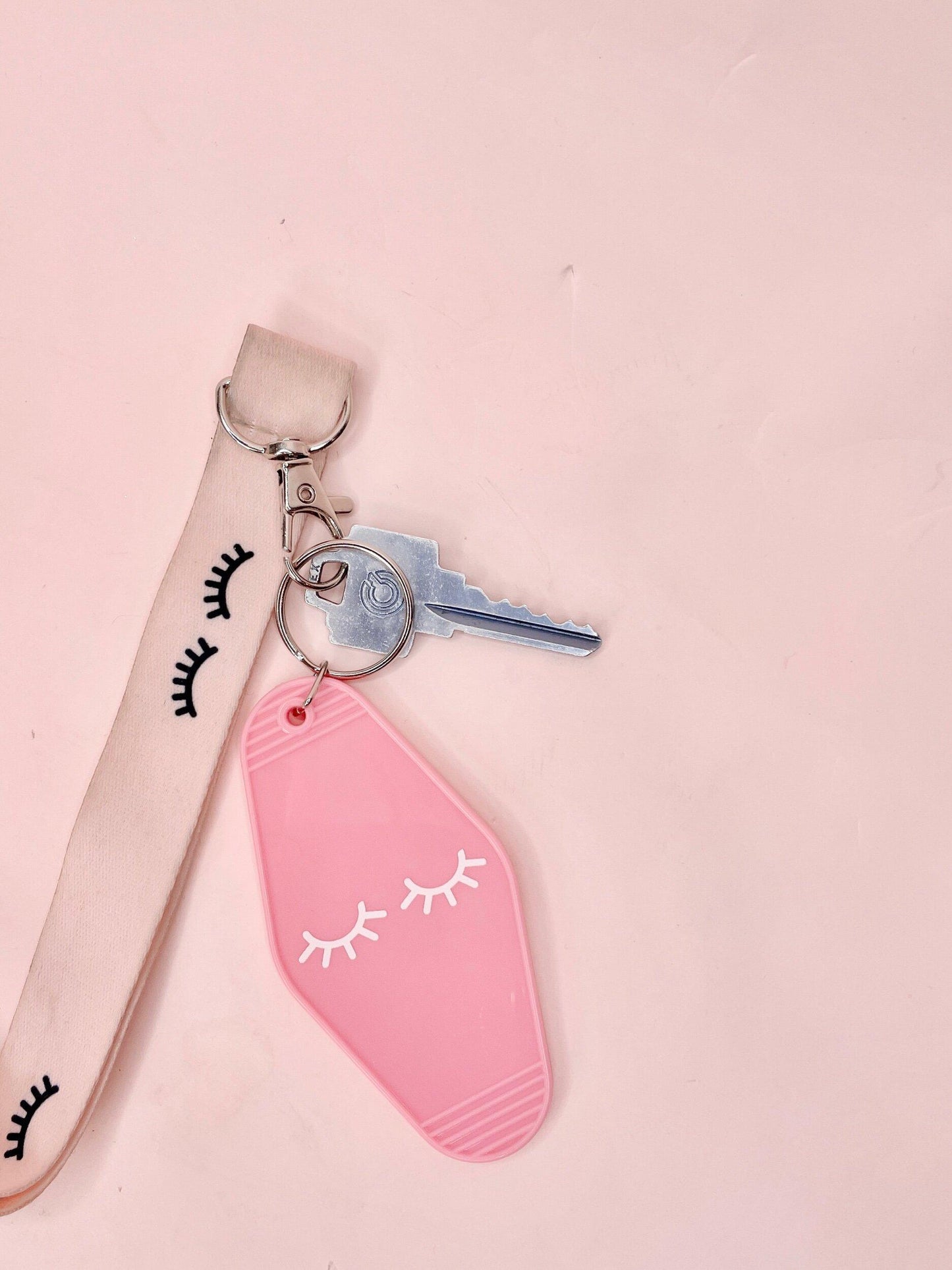baby pink lash motel keychain